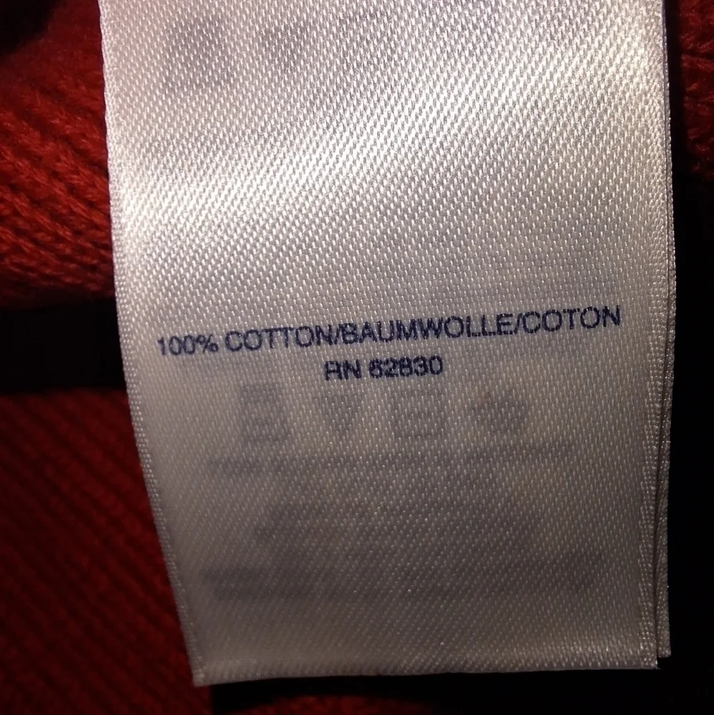 A Lands End cable knit sweater in a size medium 100% cotton.